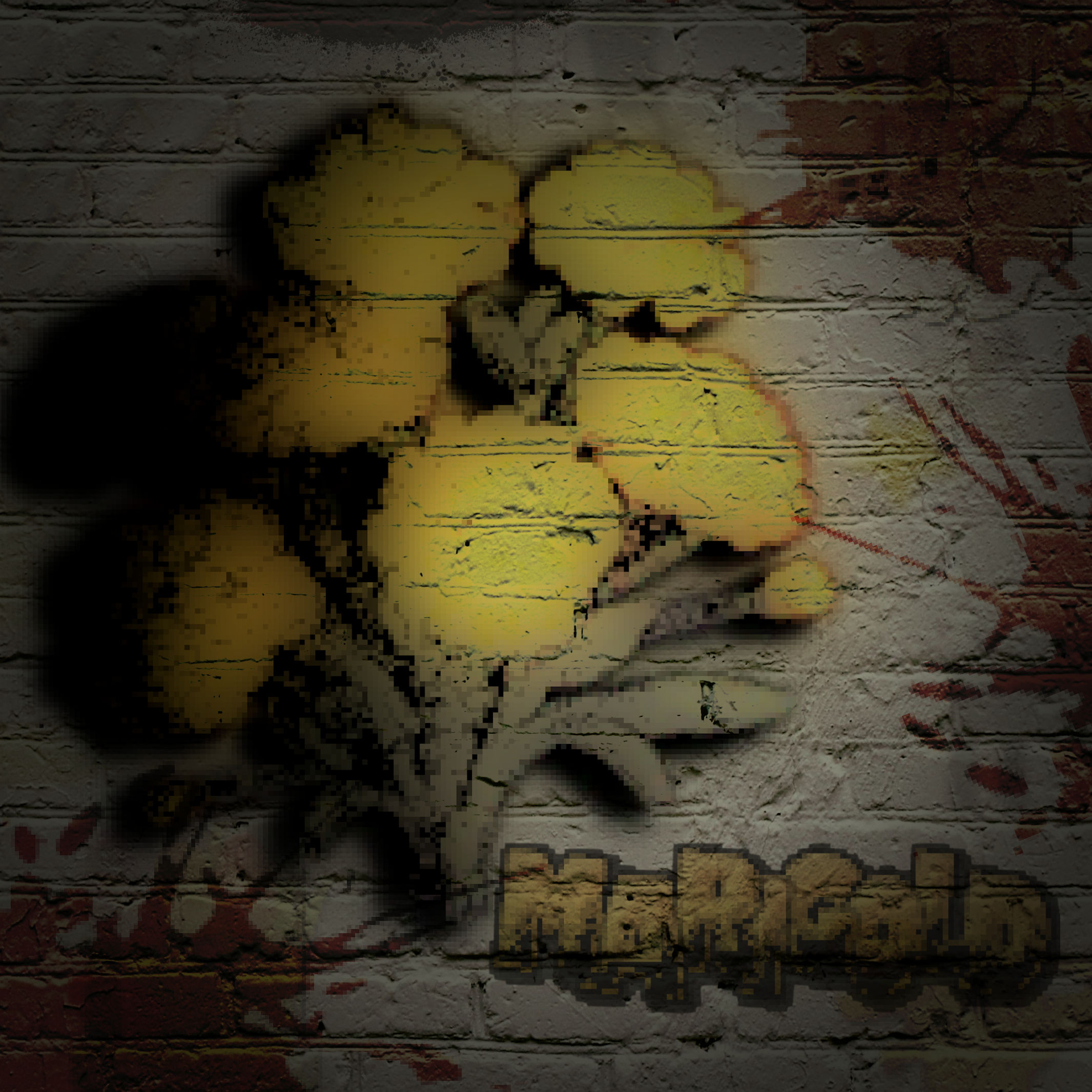 Various graffiti on a brick wall